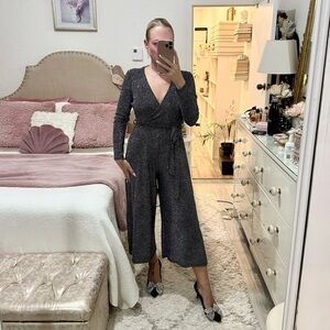 Black with silver glitter wide legged jumpsuit - perfect for the holidays!